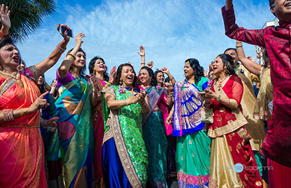 Guests celebrating outdoors at a South Asian destination wedding in the USA